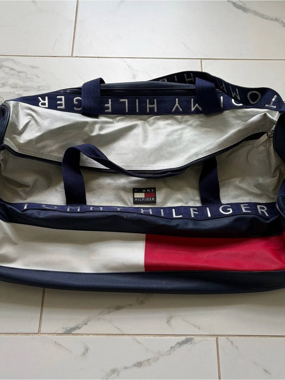 Tommy Hilfiger measures approximately
